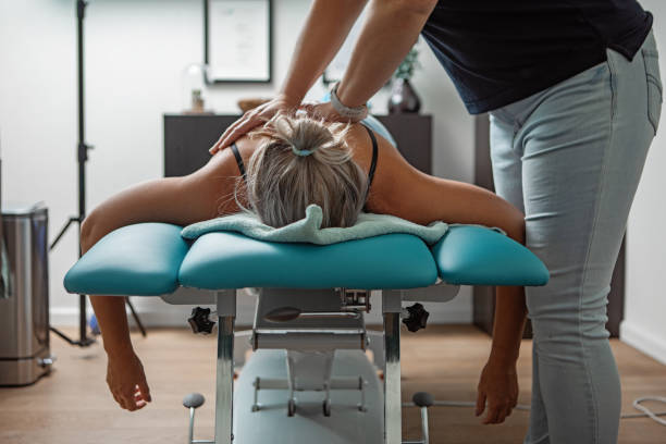 What are the benefits of seeking chiropractic care for back pain in Carrollton, TX?