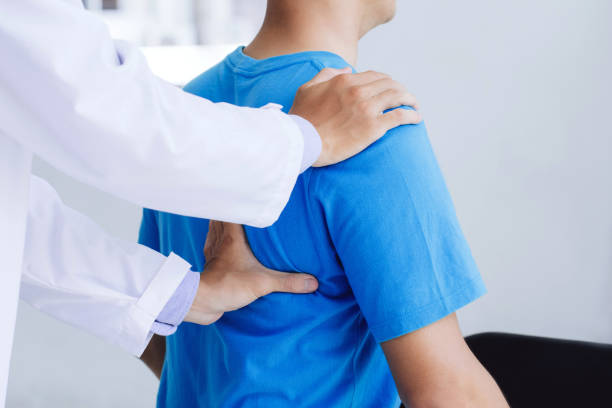 What is a chiropractor's role in treating back pain in Carrollton, TX?
